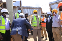 Hon-Obiga-Kania-visit-to-Biiso-market-before-it-was-completed
