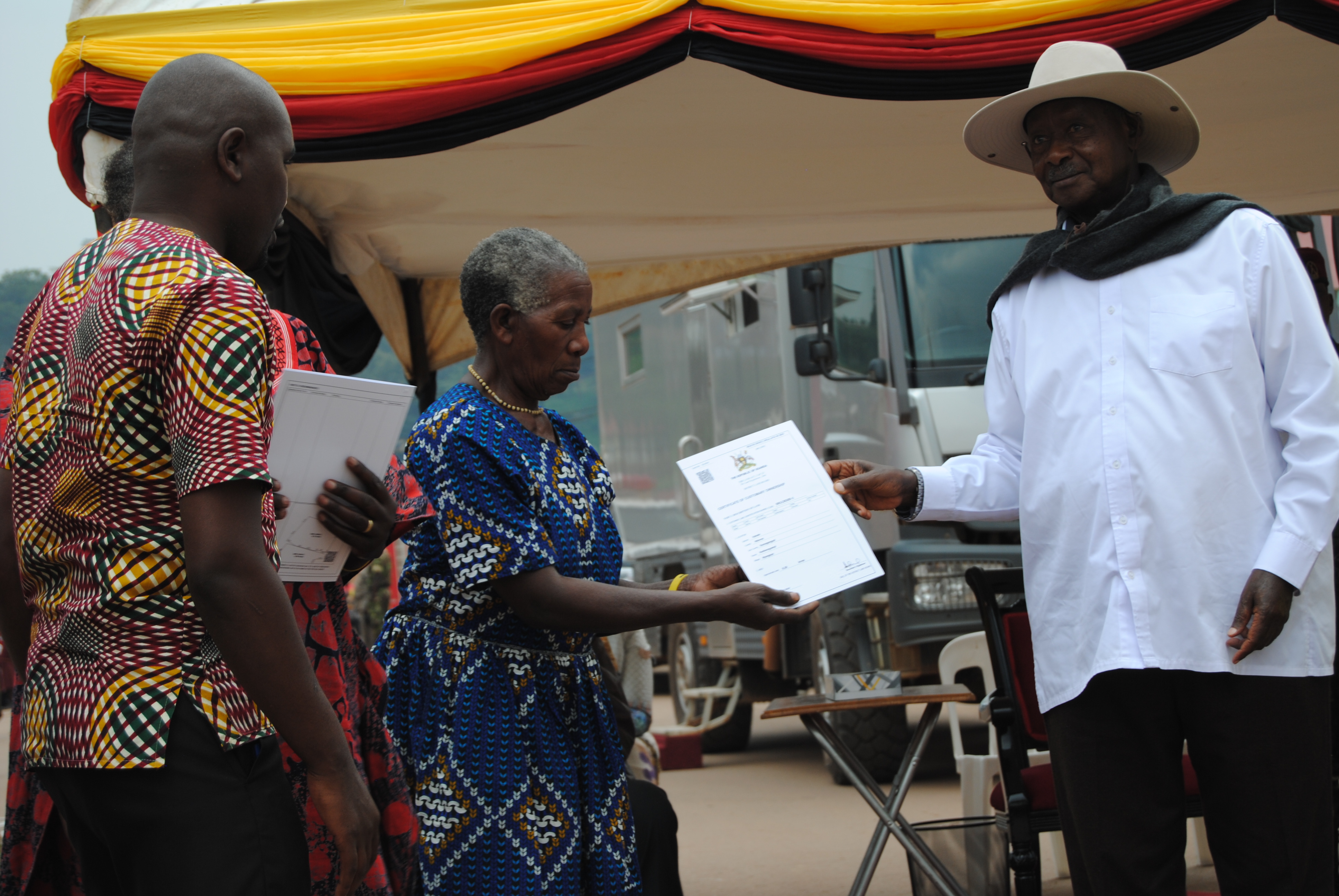 H.E The President Handing over Customary Land Titles to owners in Kabale